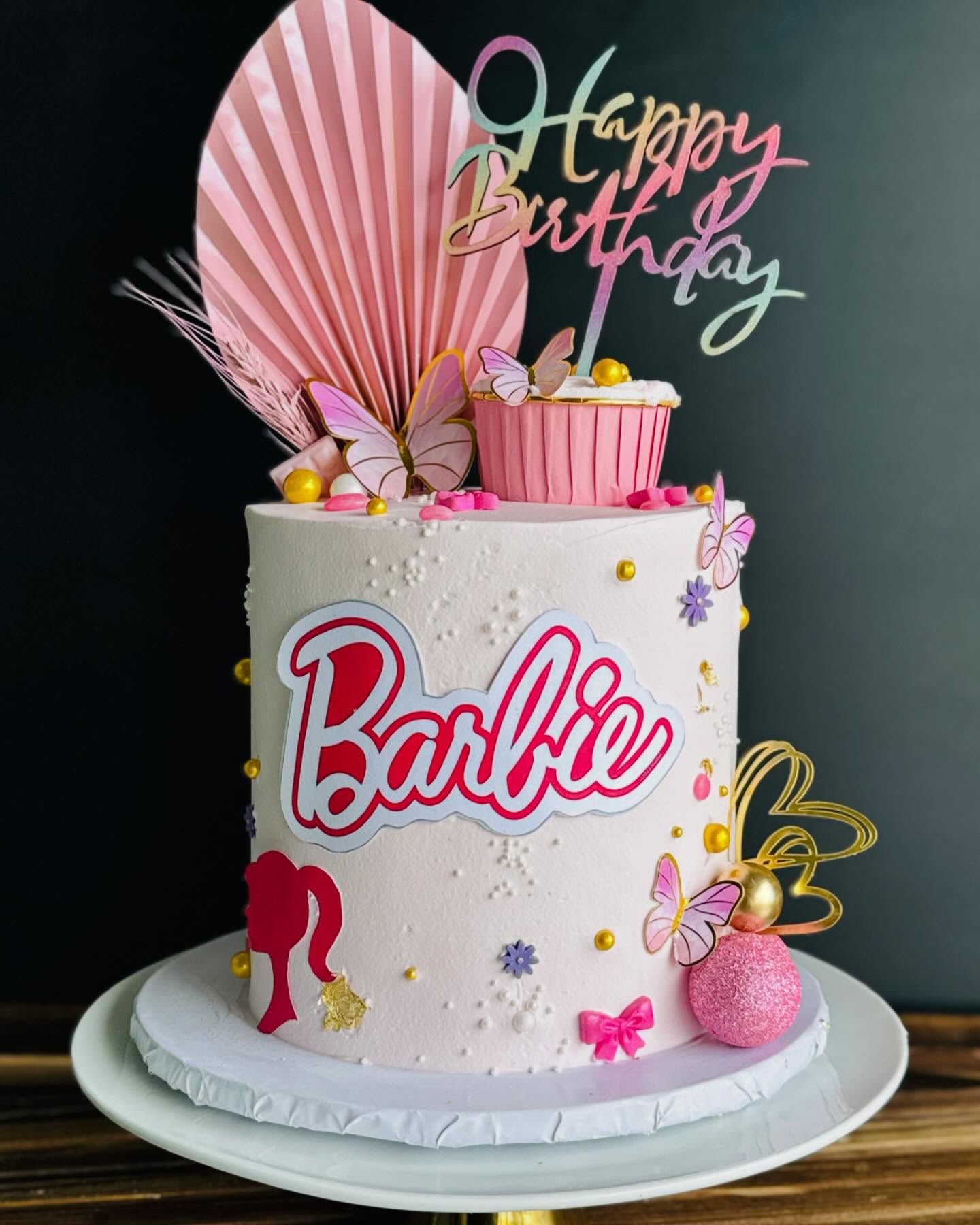 Pink Barbie-themed birthday cake